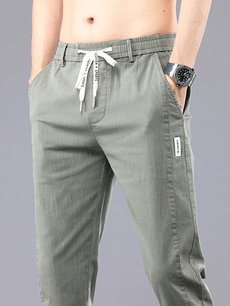 Brand Clothing Men's Casual Pants Spring Summer Thin Cotton Elastic Waist Design Jogging Trousers Solid Korean Men Sweatpants